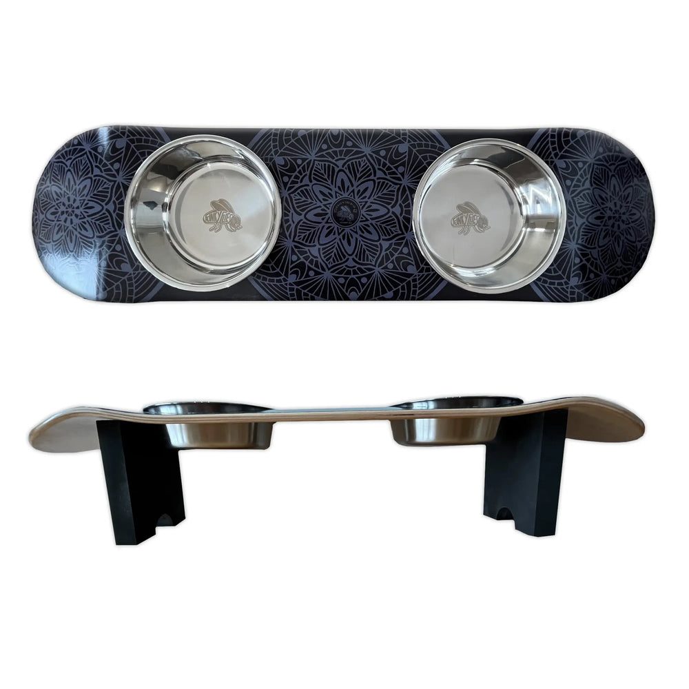 Funky Flies Dream Catcher skateboard dog feeder in black with two steel bowls, seen from above and from the side