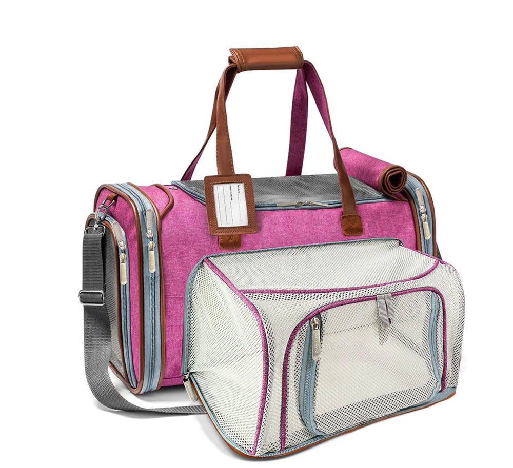 Mr. Peanut's Gold Series Mini expandable dog carrier in rosa pink with the side panel open