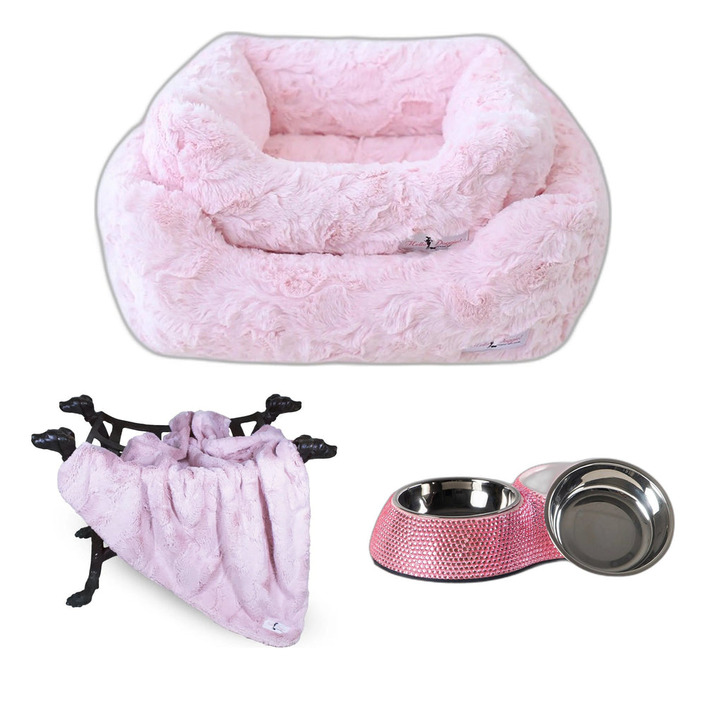 Pink plush small dog bed, blush dog blanket and pink crystal double dog bowl on white
